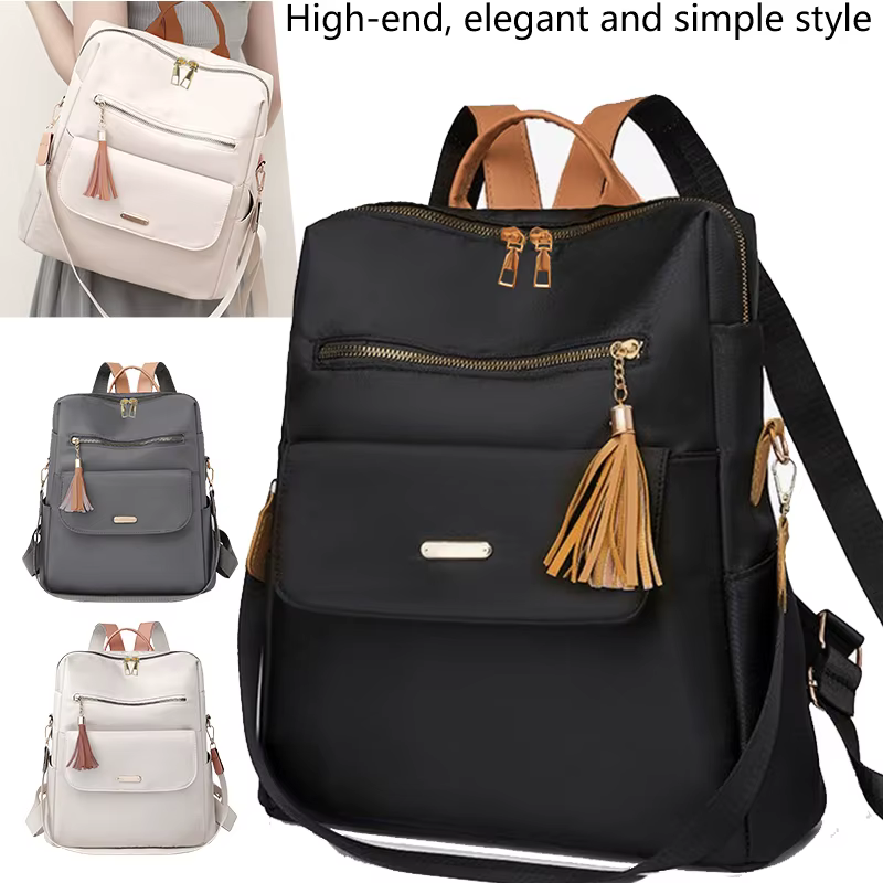 Sac à dos chic et élégant multicolore avec détail pompon