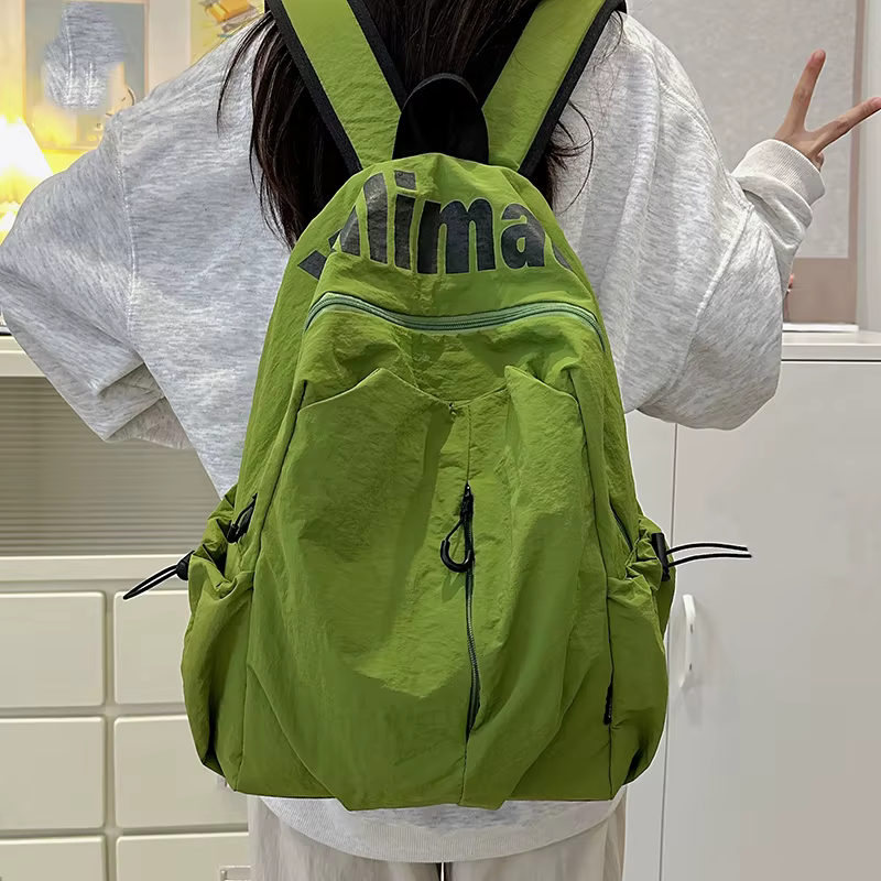 Sac à dos décontracté, mode Simple grande capacité hommes et femmes avec le même Style sac à dos de transport