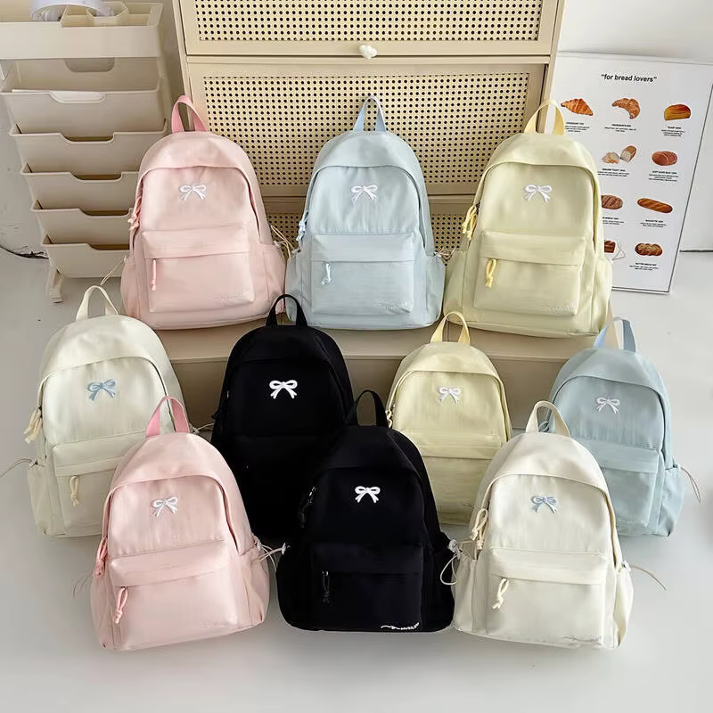Nouveau sac à dos brodé élégant Style coréen japonais mignon sac d'école décontracté pour filles étudiants sac de voyage pour les déplacements quotidiens