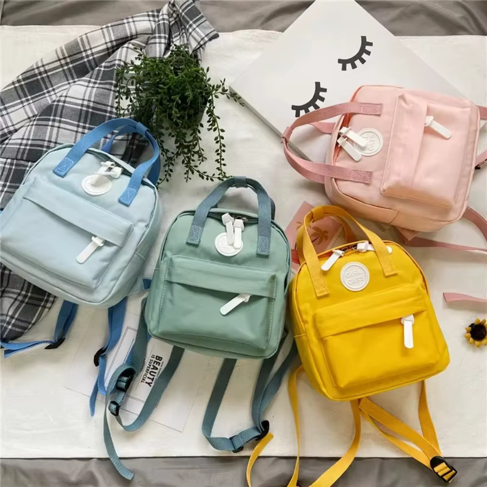 Sacs à dos pour enfants 2022 nouveau sac d'école pour filles rétro femmes Mini sac à dos mode couleur unie petits