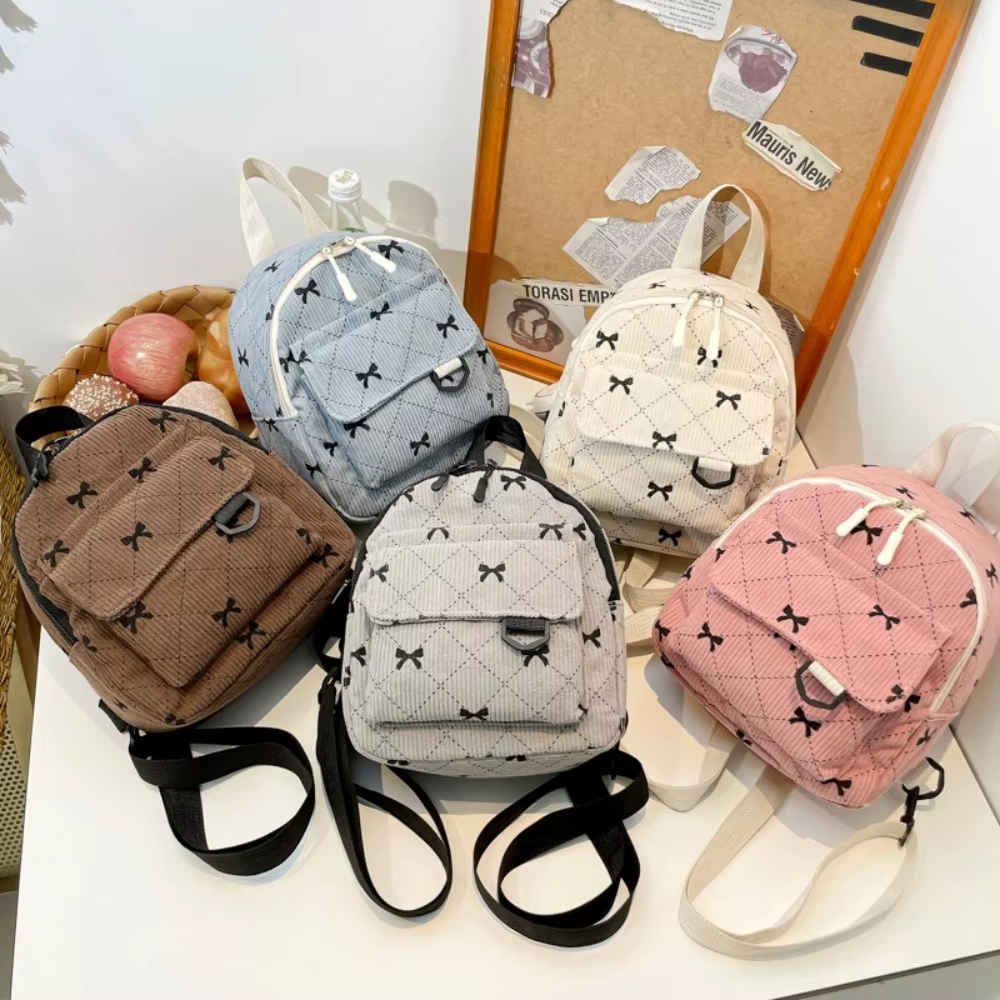 Mini sac à dos doux fille nœud papillon imprimé sac à bandoulière voyage sac de rangement cosmétique Version coréenne Ins Bookbags sac à dos décontracté